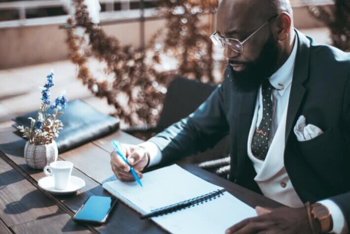 An,African,Writer,With,A,Full-grown,Beard,Sitting,On, VOC for Sales